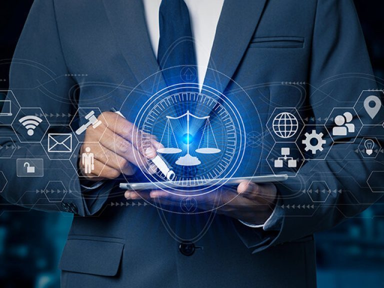 Justice and law concept. Lawyer businessman holding digital tablet and law innovation network icons. blurred background.